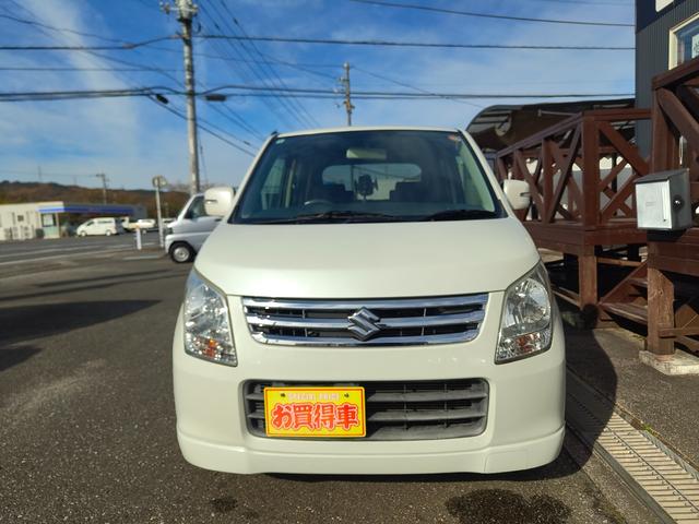 ワゴンＲ ＦＸリミテッドＩＩ　検９年４月　歴無　スマートキー・プッシュスタート・電格ミラー・オートエアコン・フルフラットシート・ヘッドライトレベライザー・車載工具・パンク修理キット・空気入れ・ポータブルカーナビ・１５５／６５／１４（7枚目）