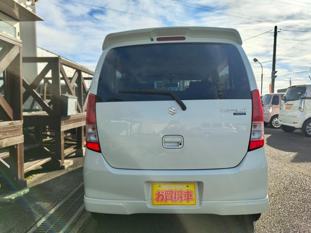 ワゴンＲ ＦＸリミテッドＩＩ　検９年４月　歴無　スマートキー・プッシュスタート・電格ミラー・オートエアコン・フルフラットシート・ヘッドライトレベライザー・車載工具・パンク修理キット・空気入れ・ポータブルカーナビ・１５５／６５／１４（8枚目）