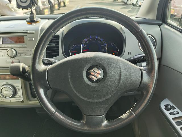 ワゴンＲ ＦＸリミテッドＩＩ　検９年４月　歴無　スマートキー・プッシュスタート・電格ミラー・オートエアコン・フルフラットシート・ヘッドライトレベライザー・車載工具・パンク修理キット・空気入れ・ポータブルカーナビ・１５５／６５／１４（23枚目）