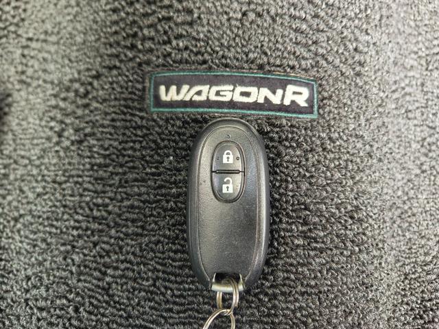 ワゴンＲ ＦＸリミテッドＩＩ　検９年４月　歴無　スマートキー・プッシュスタート・電格ミラー・オートエアコン・フルフラットシート・ヘッドライトレベライザー・車載工具・パンク修理キット・空気入れ・ポータブルカーナビ・１５５／６５／１４（40枚目）