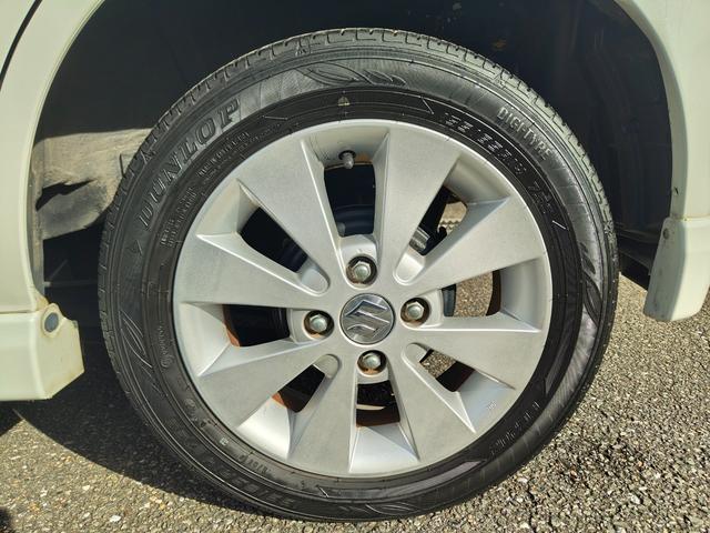 ワゴンＲ ＦＸリミテッドＩＩ　検９年４月　歴無　スマートキー・プッシュスタート・電格ミラー・オートエアコン・フルフラットシート・ヘッドライトレベライザー・車載工具・パンク修理キット・空気入れ・ポータブルカーナビ・１５５／６５／１４（44枚目）