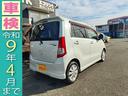 ワゴンＲ ＦＸリミテッドＩＩ　検９年４月　歴無　スマートキー・プッシュスタート・電格ミラー・オートエアコン・フルフラットシート・ヘッドライトレベライザー・車載工具・パンク修理キット・空気入れ・ポータブルカーナビ・１５５／６５／１４（5枚目）