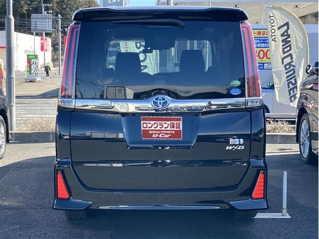 ノア ハイブリッドＳｉ　ダブルバイビー　ＬＥＤヘッドライト　クルコン　横滑り防止装置　盗難防止システム　エアバッグ　アルミ　メモリ－ナビ　スマキー　Ｗエアコン　ＡＢＳ　ナビ＆ＴＶ　デュアルエアバッグ　ＥＴＣ　ＤＶＤ　パワーウインドウ（3枚目）