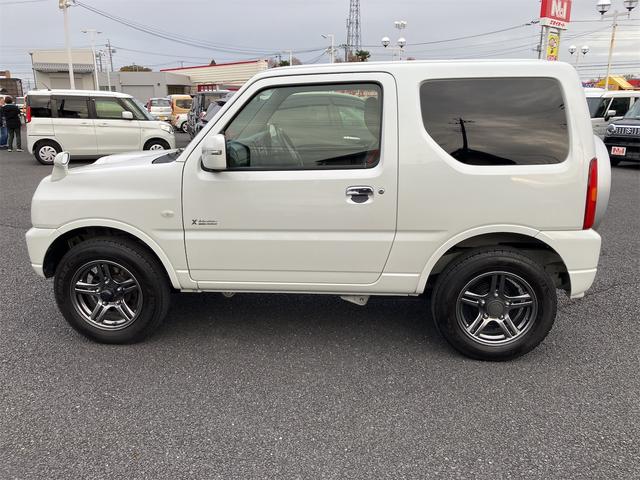 ジムニー クロスアドベンチャー エアコン パワーステアリング パワーウィンドウ Wエアバッグ ABS 社外ナビ ETC車載器 ドライブレコーダー 本革シート 純正アルミ キーレス(5枚目)