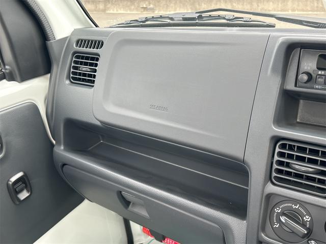 キャリイトラック ＫＣエアコン・パワステ　４ＷＤ　ＭＴ　クリアランスソナー　アイドリングストップ　オートライト　ＥＳＣ　エアコン　パワーステアリング　パワーウィンドウ　運転席エアバッグ　助手席エアバッグ（11枚目）