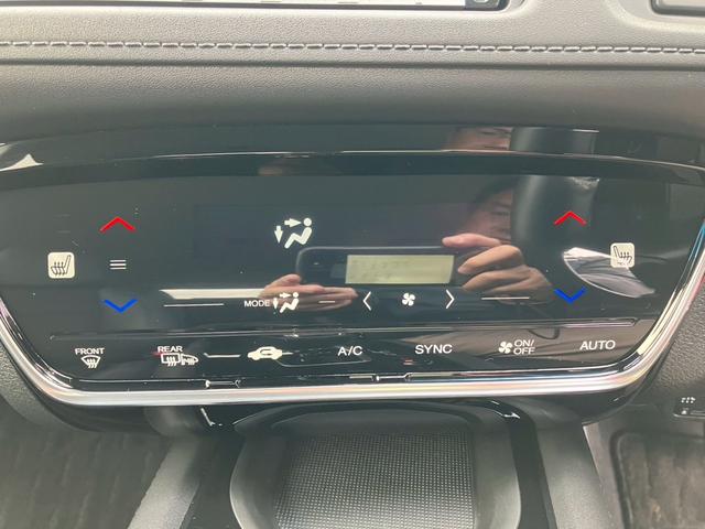 ヴェゼル ハイブリッドＺ・ホンダセンシング　ナビゲーション　ＥＴＣ車載器　キーフリー　エンジンプッシュスタート　バックカメラ　オートエアコン　電動格納ミラー　ステアリングリモコン　パワーステアリング　パワーウインドウ　プライバシーガラス（22枚目）