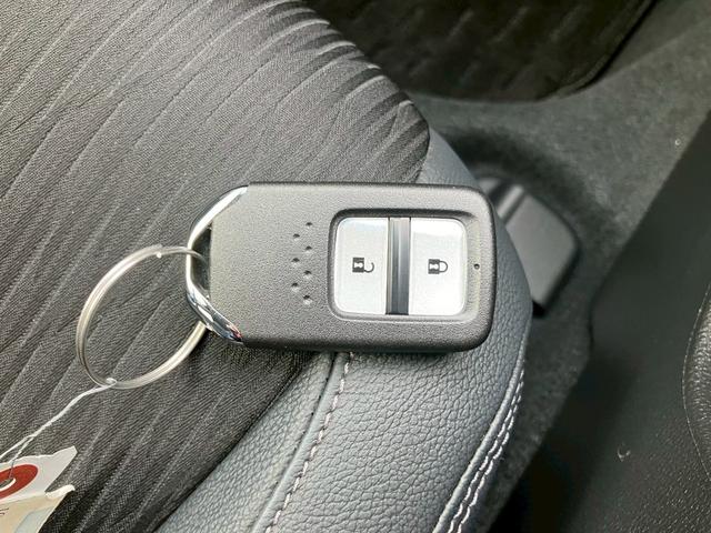 ヴェゼル ハイブリッドＺ・ホンダセンシング　ナビゲーション　ＥＴＣ車載器　キーフリー　エンジンプッシュスタート　バックカメラ　オートエアコン　電動格納ミラー　ステアリングリモコン　パワーステアリング　パワーウインドウ　プライバシーガラス（28枚目）