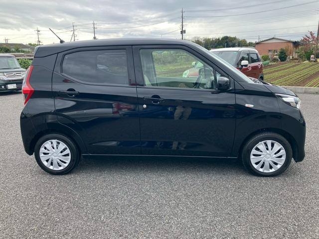 eKワゴン M 9インチ純正ナビ アイドリングストップ バックカメラ キーレス シートリフター 電動格納ミラー プライバシーガラス ステアリングリモコン(7枚目)