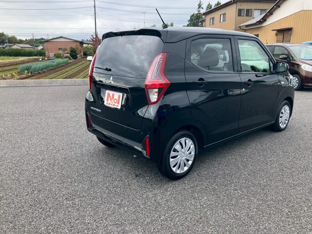 eKワゴン M 9インチ純正ナビ アイドリングストップ バックカメラ キーレス シートリフター 電動格納ミラー プライバシーガラス ステアリングリモコン(8枚目)