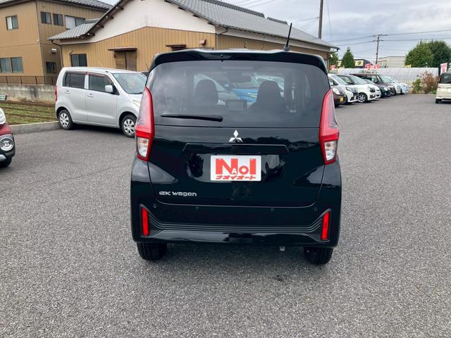 eKワゴン M 9インチ純正ナビ アイドリングストップ バックカメラ キーレス シートリフター 電動格納ミラー プライバシーガラス ステアリングリモコン(9枚目)