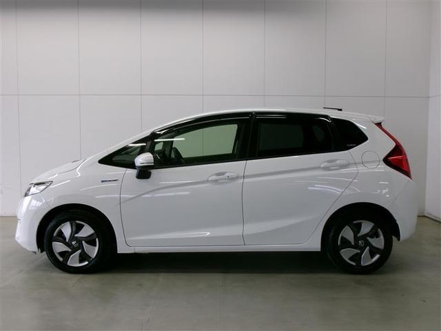 フィットハイブリッド Ｆ　記録簿　地デジＴＶ　ナビＴＶ　リアカメラ　横滑り防止装置　フルオートエアコン　キーフリーシステム　全席パワーウインドウ　パワーステアリング　ＡＢＳ　メモリーナビ　ＥＴＣ　スマートキー＆プッシュスタート（3枚目）