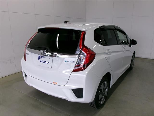 フィットハイブリッド Ｆ　記録簿　地デジＴＶ　ナビＴＶ　リアカメラ　横滑り防止装置　フルオートエアコン　キーフリーシステム　全席パワーウインドウ　パワーステアリング　ＡＢＳ　メモリーナビ　ＥＴＣ　スマートキー＆プッシュスタート（4枚目）