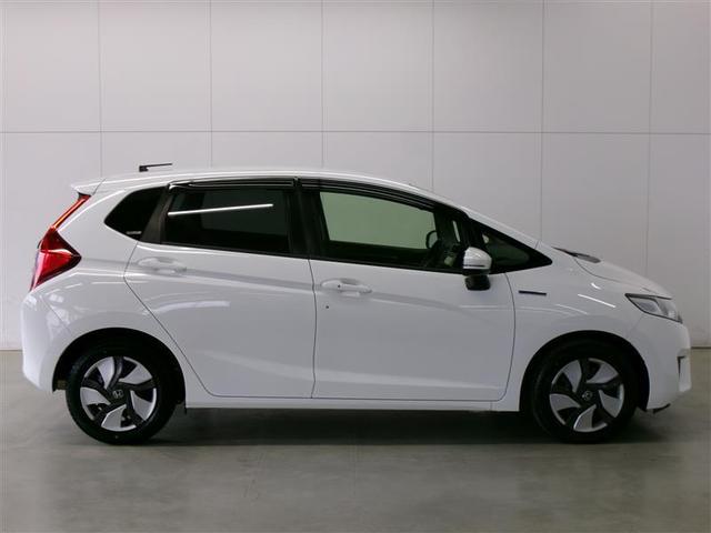 フィットハイブリッド Ｆ　記録簿　地デジＴＶ　ナビＴＶ　リアカメラ　横滑り防止装置　フルオートエアコン　キーフリーシステム　全席パワーウインドウ　パワーステアリング　ＡＢＳ　メモリーナビ　ＥＴＣ　スマートキー＆プッシュスタート（6枚目）