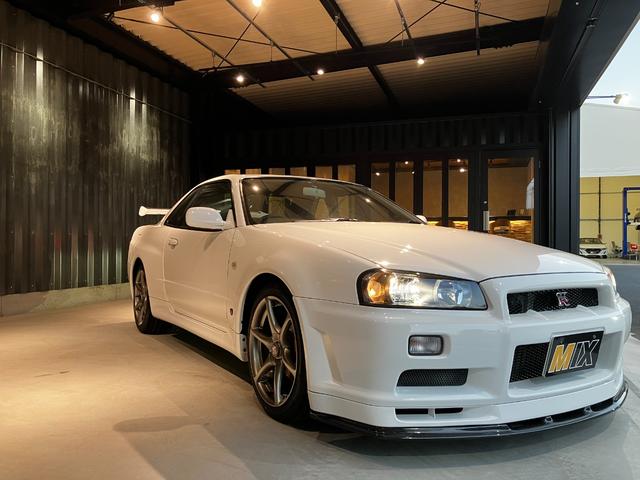 スカイライン ＧＴ－Ｒ　ＶスペックＩＩ　ＧＴ－Ｒ３４　ＶスペックＩＩ　ＧＴ－Ｒフロアーマット　ＧＴ－Ｒ純正ステアリングＧＴ－Ｒ純正ＡＷ１８インチ　点検記録簿２３枚有　ＥＴＣ　純正カーボンボンネット　取説　保証書　ＧＴ－Ｒロゴ入りスペアキー（6枚目）