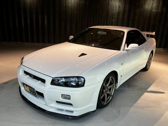 スカイライン ＧＴ－Ｒ　ＶスペックＩＩ　ＧＴ－Ｒ３４　ＶスペックＩＩ　ＧＴ－Ｒフロアーマット　ＧＴ－Ｒ純正ステアリングＧＴ－Ｒ純正ＡＷ１８インチ　点検記録簿２３枚有　ＥＴＣ　純正カーボンボンネット　取説　保証書　ＧＴ－Ｒロゴ入りスペアキー（21枚目）