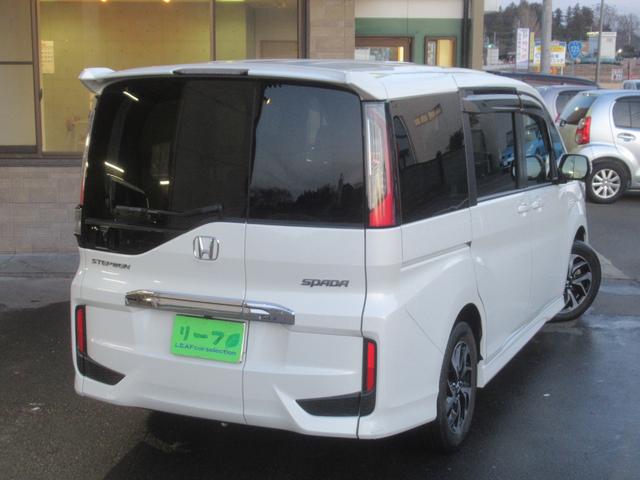 ステップワゴンスパーダ スパーダ　ホンダセンシング　７人乗／ワンオーナー／雹害車／１０インチナビ／両側オートスライド（3枚目）