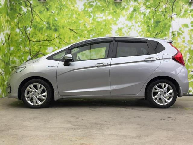 フィットハイブリッド ハイブリッド・Ｌホンダセンシング　保証書／純正　ＳＤナビ／衝突安全装置／車線逸脱防止支援システム／シート　ハーフレザー／ヘッドランプ　ＬＥＤ／Ｂｌｕｅｔｏｏｔｈ接続／ＥＴＣ／ＥＢＤ付ＡＢＳ／横滑り防止装置／アイドリングストップ（2枚目）