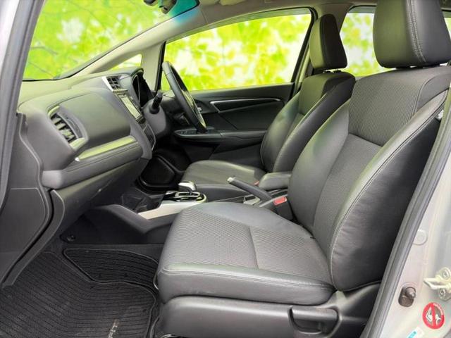 フィットハイブリッド ハイブリッド・Ｌホンダセンシング　保証書／純正　ＳＤナビ／衝突安全装置／車線逸脱防止支援システム／シート　ハーフレザー／ヘッドランプ　ＬＥＤ／Ｂｌｕｅｔｏｏｔｈ接続／ＥＴＣ／ＥＢＤ付ＡＢＳ／横滑り防止装置／アイドリングストップ（6枚目）