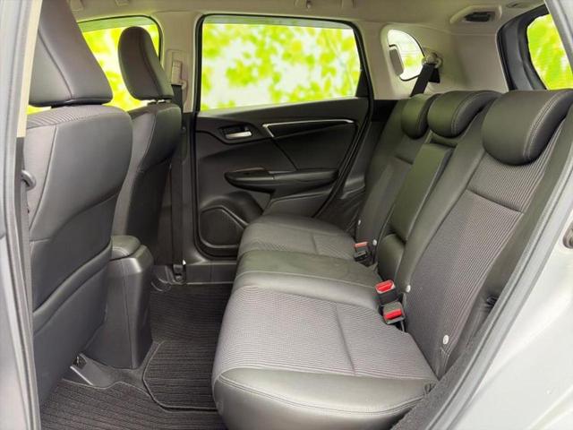 フィットハイブリッド ハイブリッド・Ｌホンダセンシング　保証書／純正　ＳＤナビ／衝突安全装置／車線逸脱防止支援システム／シート　ハーフレザー／ヘッドランプ　ＬＥＤ／Ｂｌｕｅｔｏｏｔｈ接続／ＥＴＣ／ＥＢＤ付ＡＢＳ／横滑り防止装置／アイドリングストップ（7枚目）