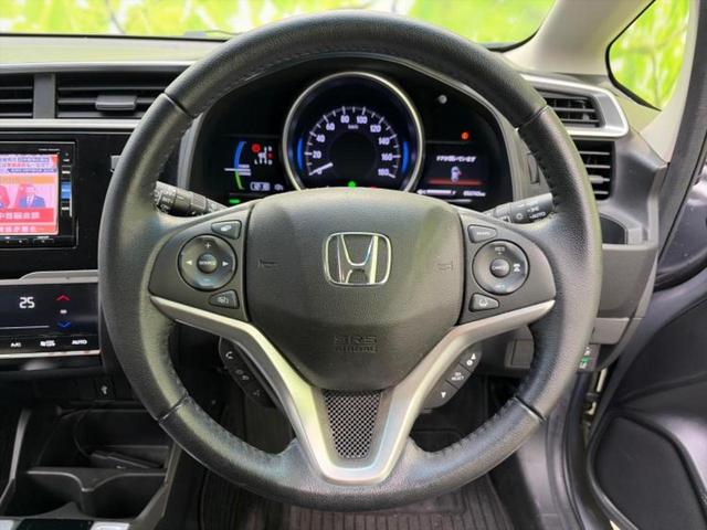 フィットハイブリッド ハイブリッド・Ｌホンダセンシング　保証書／純正　ＳＤナビ／衝突安全装置／車線逸脱防止支援システム／シート　ハーフレザー／ヘッドランプ　ＬＥＤ／Ｂｌｕｅｔｏｏｔｈ接続／ＥＴＣ／ＥＢＤ付ＡＢＳ／横滑り防止装置／アイドリングストップ（15枚目）
