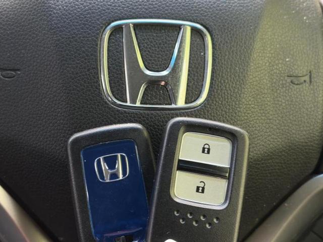 フィットハイブリッド ハイブリッド・Ｌホンダセンシング　保証書／純正　ＳＤナビ／衝突安全装置／車線逸脱防止支援システム／シート　ハーフレザー／ヘッドランプ　ＬＥＤ／Ｂｌｕｅｔｏｏｔｈ接続／ＥＴＣ／ＥＢＤ付ＡＢＳ／横滑り防止装置／アイドリングストップ（34枚目）