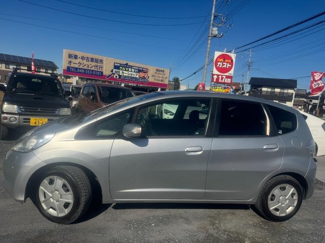 フィットハイブリッド スマートセレクション　電動ミラー　スマートキー　オートクルーズコントロール　ＥＴＣ　キーフリー　オートエアコン　ＡＢＳ　パワーウィンドウ　パワーステアリング　運転席エアバッグ　ＷエアＢ（19枚目）