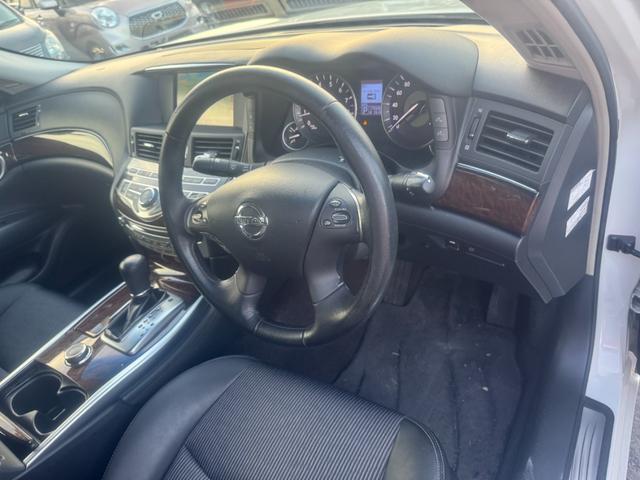 フーガ 250GT Aパッケージ 電動格納ドアミラー Bカメラ ETC オートエアコン 運転席エアバッグ パワーステアリング ABS ナビTV 助手席エアバッグ パワーウィンドウ(25枚目)