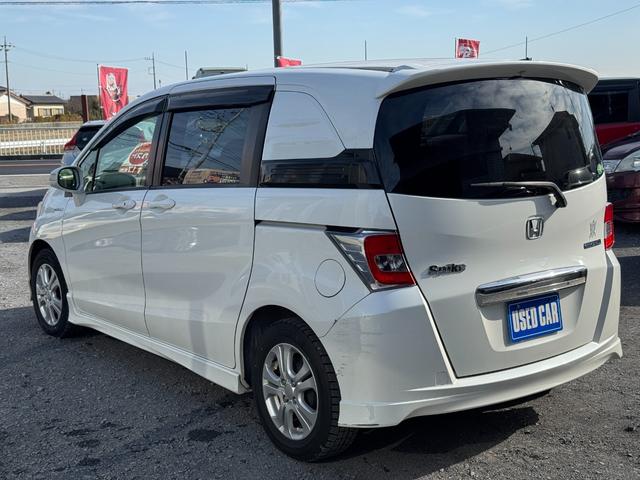 フリードスパイクハイブリッド ハイブリッド　プレミアムエディション　ＵＳＢ　両側自動ドア　Ｂカメラ　スマ－トキ－　ＥＴＣ車載器　ワンオーナー車　オートエアコン　ＤＶＤ再生　クルーズコントロール　電動格納ミラー　ＶＳＡ　Ｗエアバック　ナビＴＶ（23枚目）