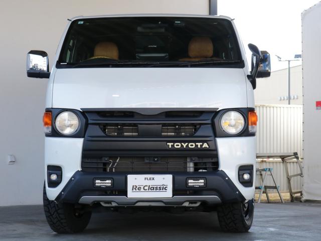 ハイエースバン スーパーＧＬ　ダークプライムＩＩ　○ＲＥクラシック丸目キット○ＴＲＤフルエアロ○リアスポイラー○シートカバー○オリジナル特注・アームレストセット○ベッドキット○ビッグＸ・ＥＴＣ・フリップダウンモニター・連動ドラレコ○ドアミラー自動格納（36枚目）