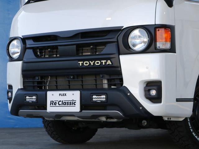 ハイエースバン スーパーＧＬ　ダークプライムＩＩ　○ＲＥクラシック丸目キット○ＴＲＤフルエアロ○リアスポイラー○シートカバー○オリジナル特注・アームレストセット○ベッドキット○ビッグＸ・ＥＴＣ・フリップダウンモニター・連動ドラレコ○ドアミラー自動格納（37枚目）