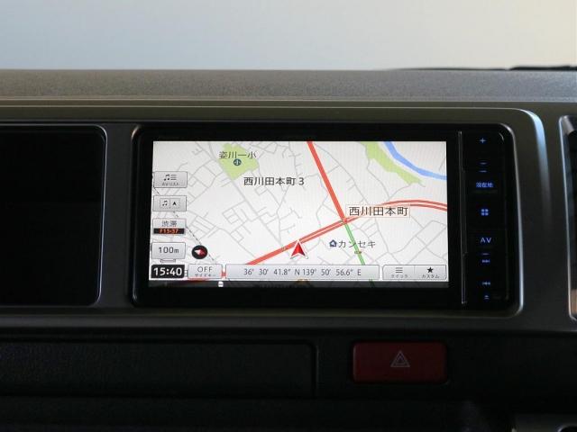 ハイエースワゴン GL ロング 内装架装Ver2・専用テーブル・専用フローリング・専用ベッドキット・オリジナルシートカバー・7インチワイドナビ・ビルトインETC・後席用フリップダウンモニター・オリジナルオーバーフェンダー・ローダウン(12枚目)