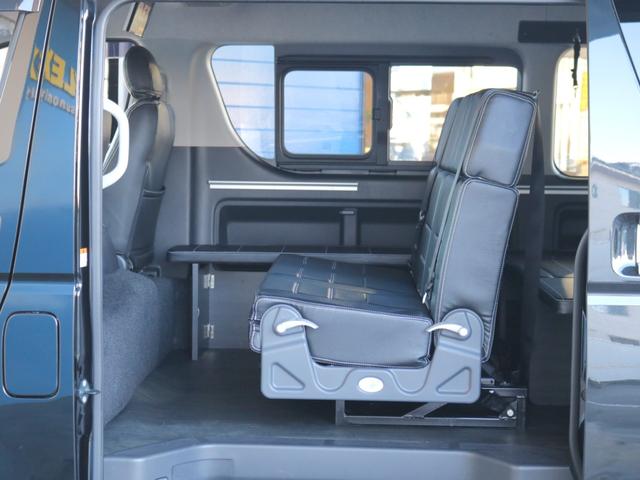 ハイエースワゴン GL ロング 内装架装Ver2・専用テーブル・専用フローリング・専用ベッドキット・オリジナルシートカバー・7インチワイドナビ・ビルトインETC・後席用フリップダウンモニター・オリジナルオーバーフェンダー・ローダウン(56枚目)