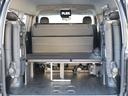 GL ロング 内装架装Ver2・専用テーブル・専用フローリング・専用ベッドキット・オリジナルシートカバー・7インチワイドナビ・ビルトインETC・後席用フリップダウンモニター・オリジナルオーバーフェンダー・ローダウン(69枚目)