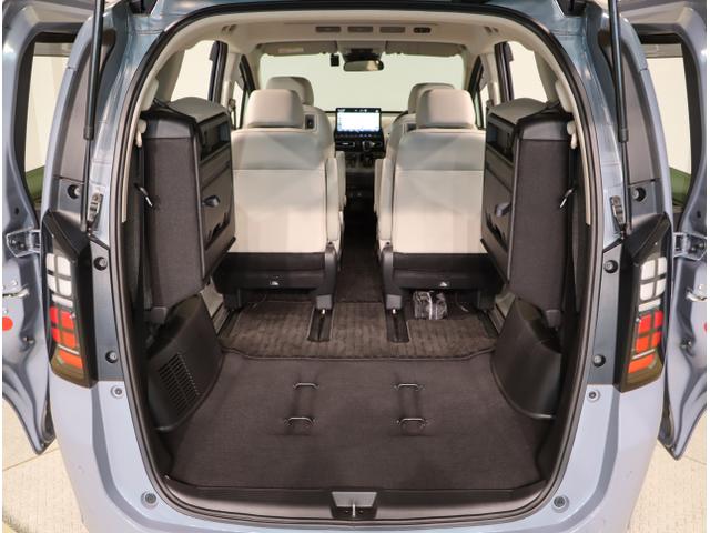 フリード エアーＥＸ　バックモニター　盗難防止システム　ＤＶＤ　両側パワースライドドア　横滑り防止装置　クルコン　フルセグ　ＥＴＣ車載器　オートエアコン　シートヒーター　ＬＥＤヘッドライト　３列シート　ＵＳＢ（48枚目）