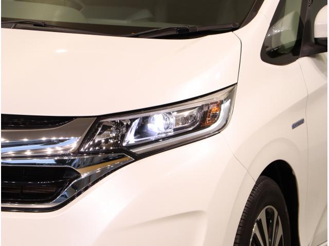 フリードハイブリッド ハイブリッド・EX 地デジフルセグTV シ-トヒ-タ- USB接続 リヤカメラ LEDライト フルオートエアコン ABS ドラレコ付 DVD再生可 ウォークスルー サイドエアバッグ キーフリー(11枚目)