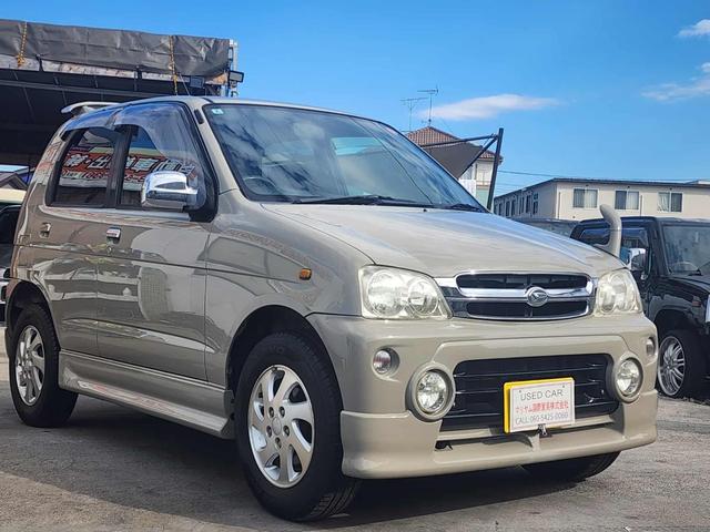 テリオスキッド カスタム メモリアルエディション 車検令和9年2月20日 色替車 電動メッキミラー。フォグランプ・純正エアロ・大型バイザー・肘掛けキーレス 修復歴無し電動格納ミラー アルミホイール 19 295(7枚目)