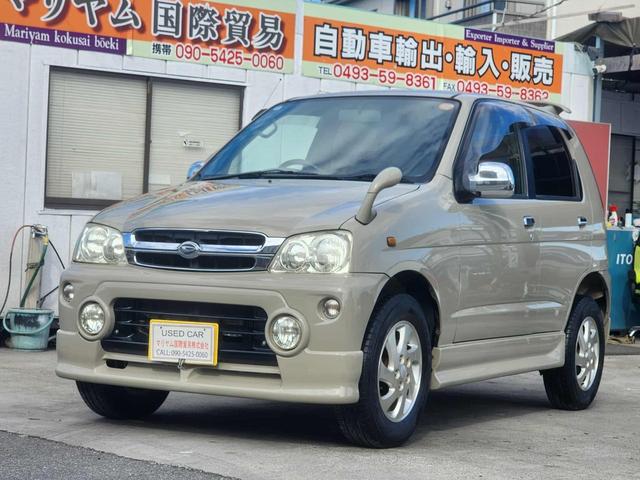 テリオスキッド カスタム メモリアルエディション 車検令和9年2月20日 色替車 電動メッキミラー。フォグランプ・純正エアロ・大型バイザー・肘掛けキーレス 修復歴無し電動格納ミラー アルミホイール 19 295(65枚目)