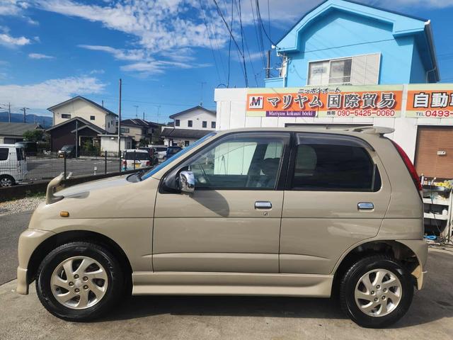 テリオスキッド カスタム メモリアルエディション 車検令和9年2月20日 色替車 電動メッキミラー。フォグランプ・純正エアロ・大型バイザー・肘掛けキーレス 修復歴無し電動格納ミラー アルミホイール 19 295(75枚目)