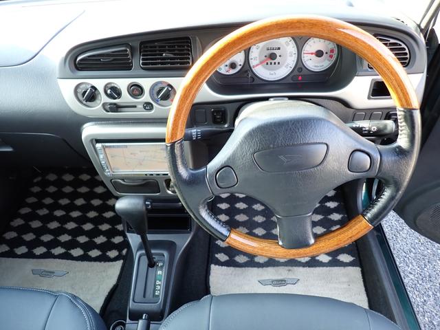 ミラジーノ ミニライトスペシャル　純正１４インチアルミ　ウッドハンドル　ＦＯＧランプ　レザーシートカバー　キーレス（3枚目）