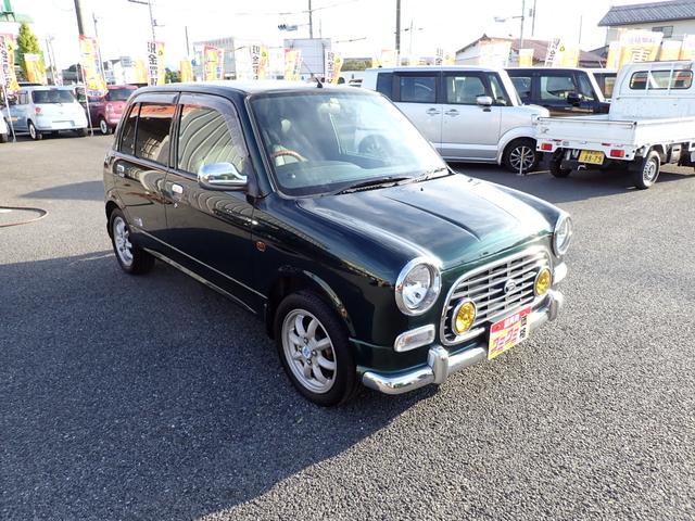 ミラジーノ ミニライトスペシャル　純正１４インチアルミ　ウッドハンドル　ＦＯＧランプ　レザーシートカバー　キーレス（8枚目）