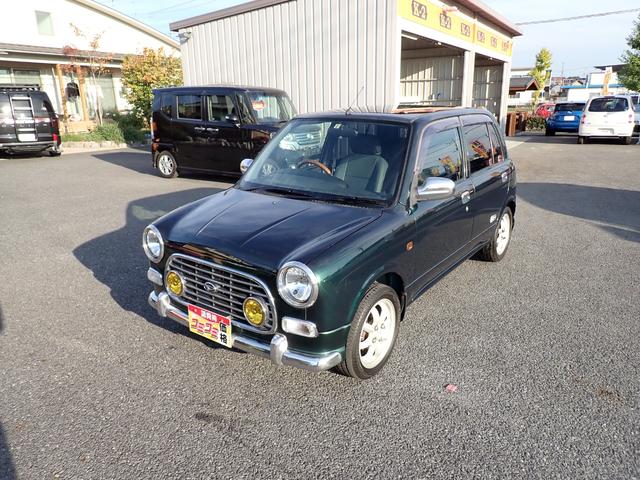 ミラジーノ ミニライトスペシャル　純正１４インチアルミ　ウッドハンドル　ＦＯＧランプ　レザーシートカバー　キーレス（9枚目）