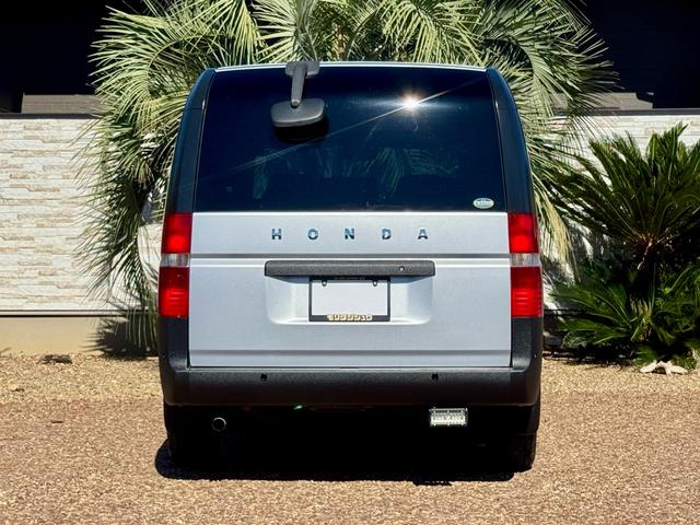 ステップワゴン I 5.6万km 車検2年付 回転シート ラプターライナー HONDAグリル クラシックカスタム ホワイトリボン 鉄ちんカスタム アメ車バンミラー サイドデカール スモークヘッドライト スムージング(6枚目)