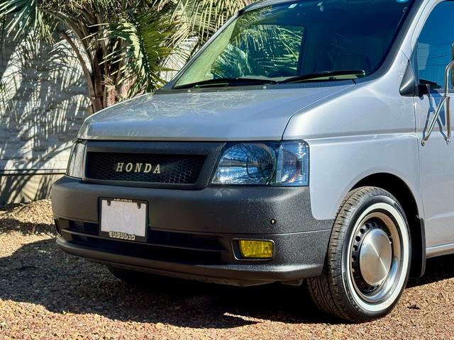 ステップワゴン I 5.6万km 車検2年付 回転シート ラプターライナー HONDAグリル クラシックカスタム ホワイトリボン 鉄ちんカスタム アメ車バンミラー サイドデカール スモークヘッドライト スムージング(9枚目)