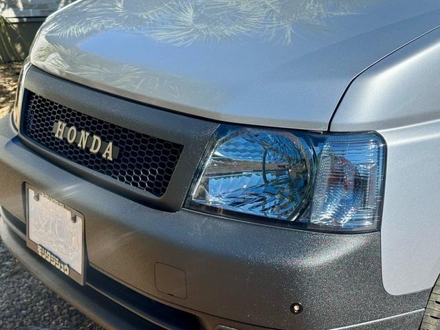 ステップワゴン I 5.6万km 車検2年付 回転シート ラプターライナー HONDAグリル クラシックカスタム ホワイトリボン 鉄ちんカスタム アメ車バンミラー サイドデカール スモークヘッドライト スムージング(10枚目)