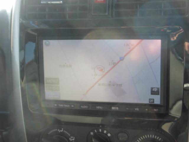 ジムニー ランドベンチャー　前席パワーウインドウ　助手席エアバック　運転席エアバッグ　４ＷＤ車　ワンセグ　キーレス付　ＰＳ　衝突安全ボディ　ＡＢＳ付　シートヒータ　ＳＤ　電動格納式ミラー　ＡＴエアコン　ＴＶ＆ナビ（33枚目）