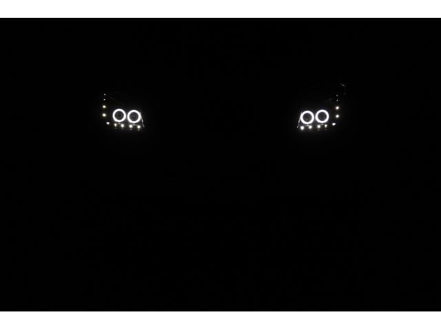 ＴＸリミテッド　４ＷＤ　リフトアップ　新品ダッシュボード交換　ブラックレザー調シートカバー　社外１７インチアルミホイール　イカリングヘッドライト　ＨＤＤナビ　ＴＶ　ＤＶＤビデオ　ＣＤ　バックカメラ　ＥＴＣ　８人乗り(28枚目)