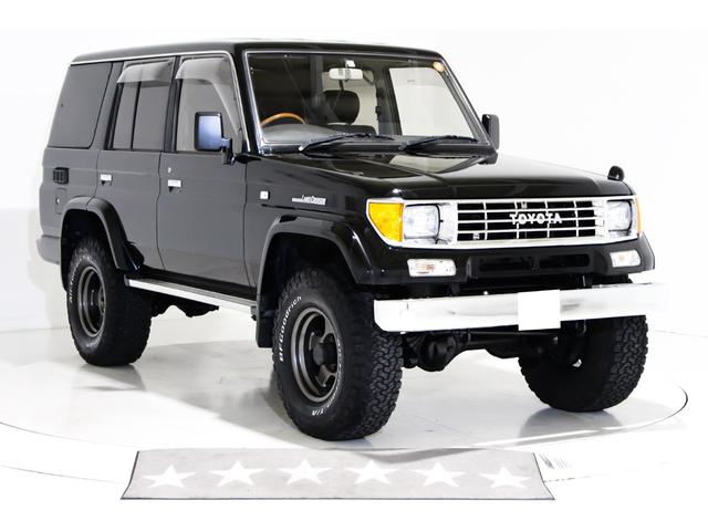 ランドクルーザープラド ＳＸワイド　４ＷＤ　リフトアップ　新品タイミングベルト交換　オールクロームメッキグリル　７０仕様クロームメッキフロントバンパー　ブラックレザー調シートカバー　　キーレス　３列シート　１ナンバー登録可能　寒冷地仕様（18枚目）