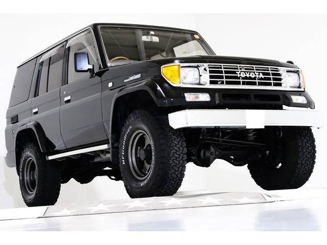 ランドクルーザープラド ＳＸワイド　４ＷＤ　リフトアップ　新品タイミングベルト交換　オールクロームメッキグリル　７０仕様クロームメッキフロントバンパー　ブラックレザー調シートカバー　　キーレス　３列シート　１ナンバー登録可能　寒冷地仕様（19枚目）