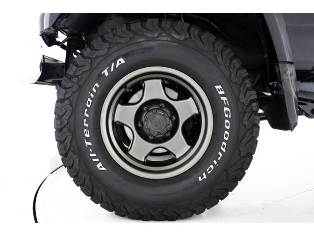 ランドクルーザープラド ＳＸワイド　４ＷＤ　リフトアップ　新品タイミングベルト交換　オールクロームメッキグリル　７０仕様クロームメッキフロントバンパー　ブラックレザー調シートカバー　　キーレス　３列シート　１ナンバー登録可能　寒冷地仕様（80枚目）