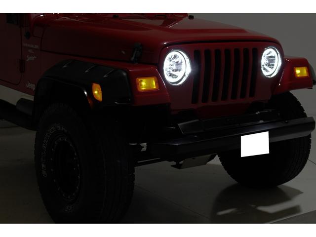 スポーツ　４ＷＤ　ソフトトップ　リフトアップ　ヒッチメンバー　ワイドオーバーフェンダー　ＬＥＤイカリング　ＬＥＤヘッドライト　ＥＴＣ　社外１５インチホイール　ジオランダーＡ／Ｔ　テールガード　サイドステップバー(34枚目)